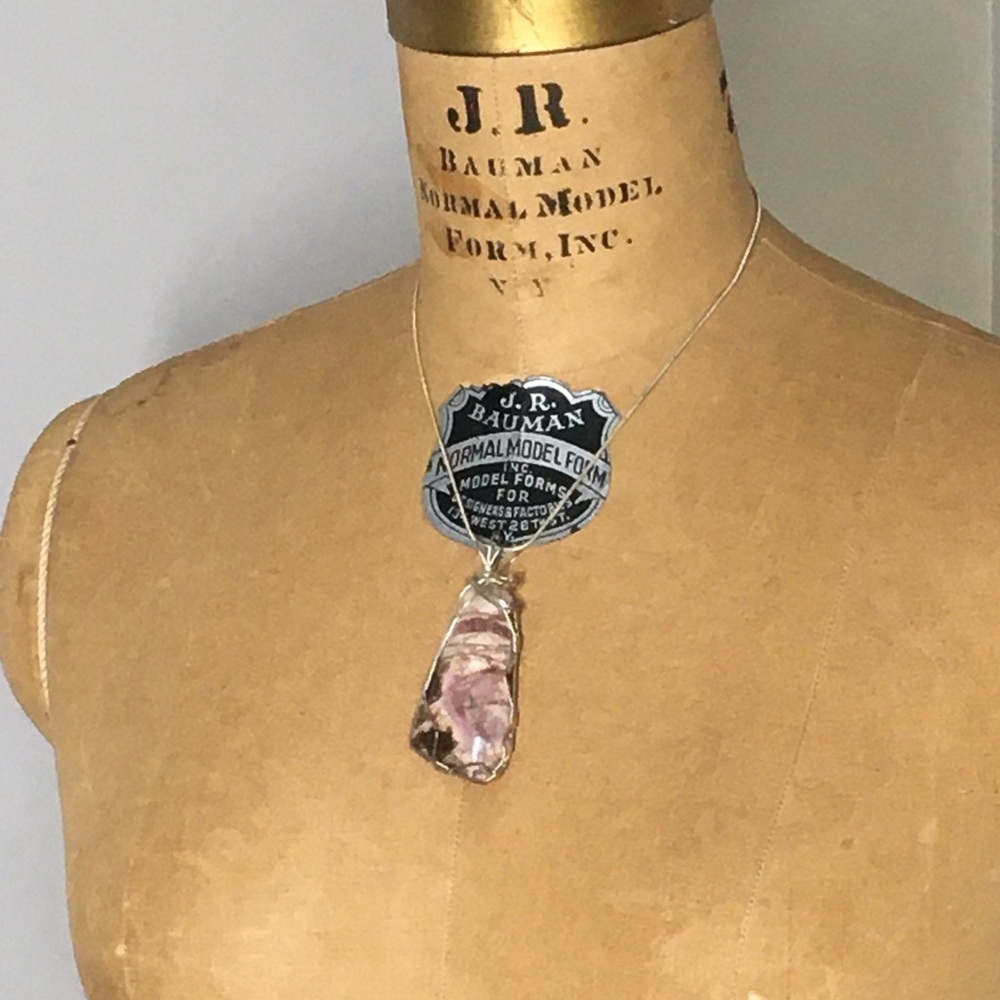 Stone and metal necklace.